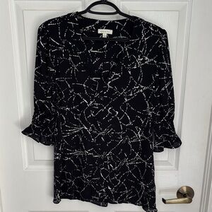 Black and White Patterned Top with Ruffled Sleeves